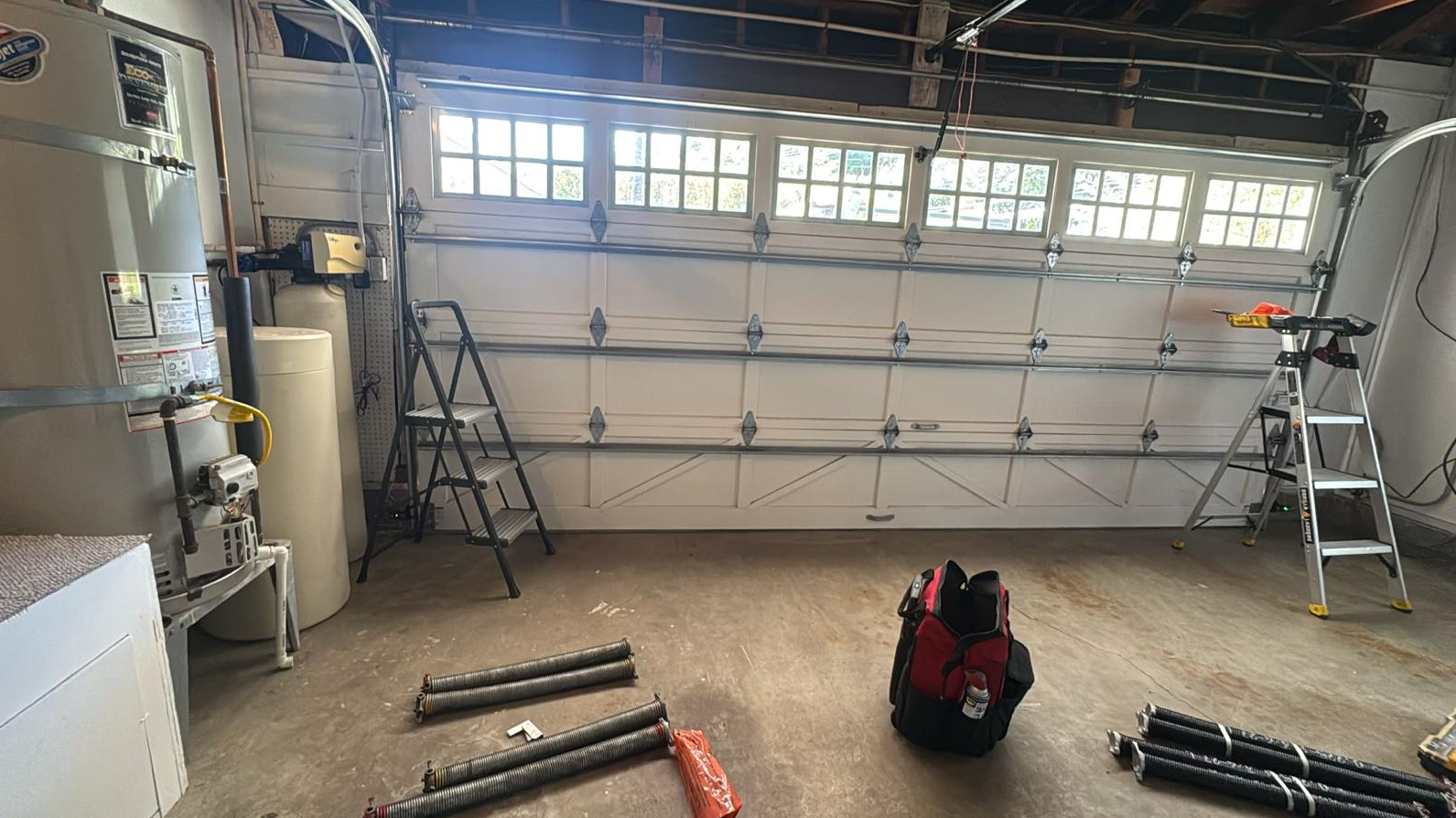 Garage door service truck and expert technician providing same-day repairs in Carol City Florida
