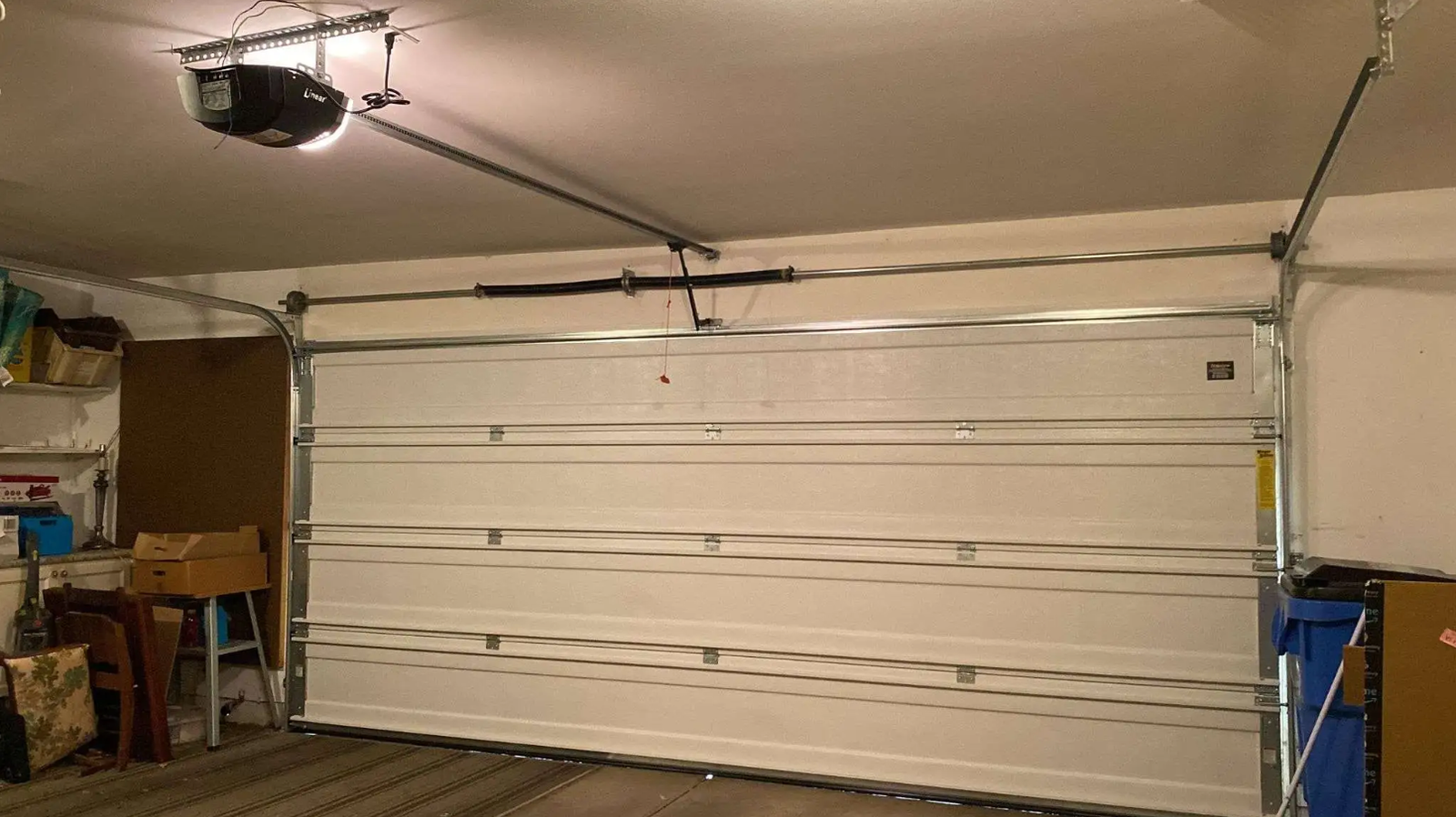 Garage door service truck and expert technician providing same-day repairs in Andover Lake Florida